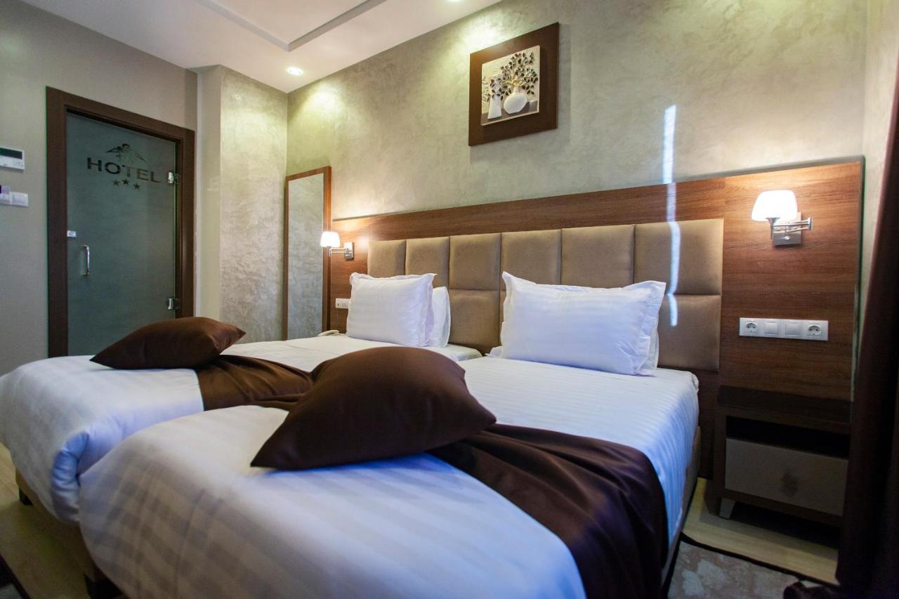 Bn Hotel Blida Bagian luar foto