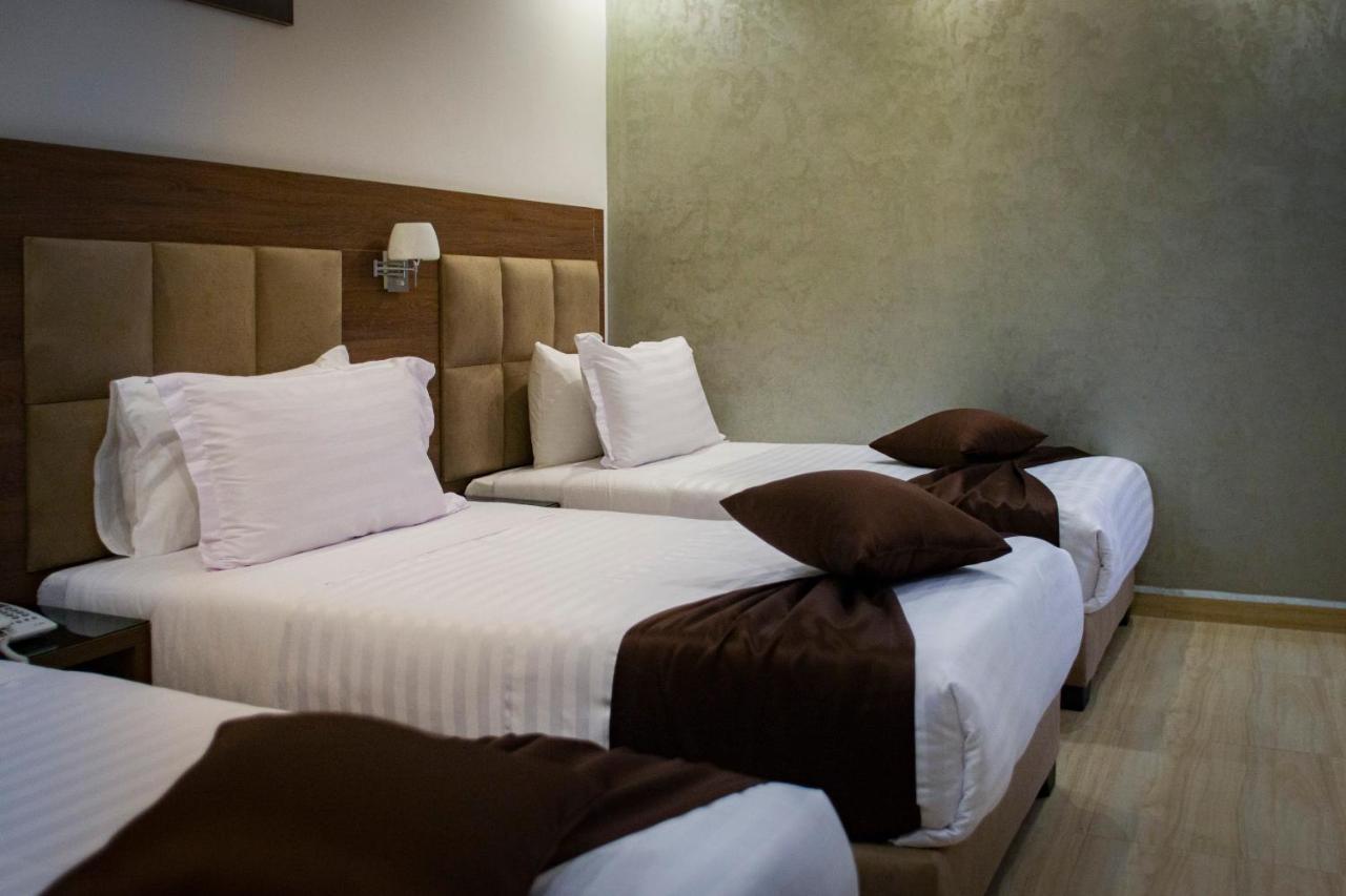 Bn Hotel Blida Bagian luar foto