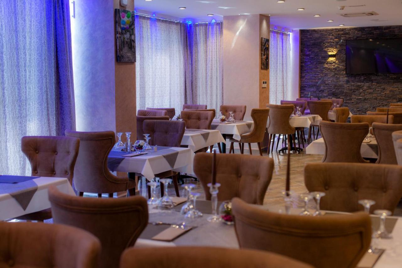 Bn Hotel Blida Bagian luar foto